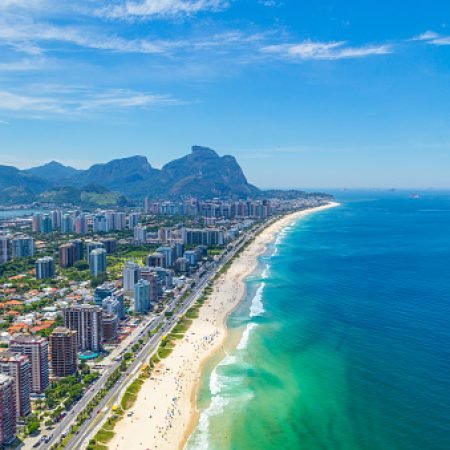 Aerial View of the Barra da Tijuca Beach in Rio de Janeiro, Brazil. One of the more popular beaches in Rio on the summer, it's a famous spot for surf competitions and other waterspouts.